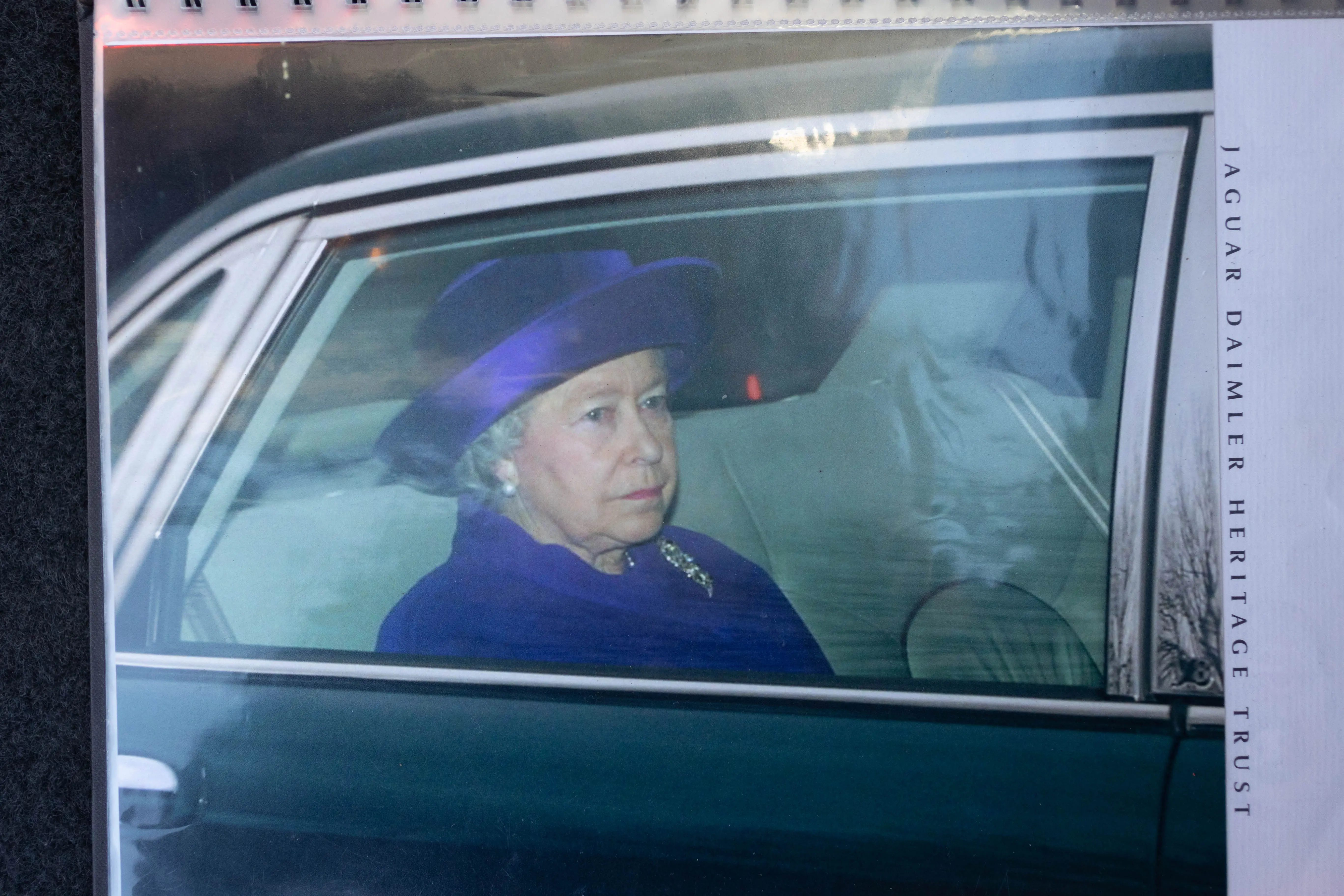 HRH Queen Elizabeth II sitting in Daimler