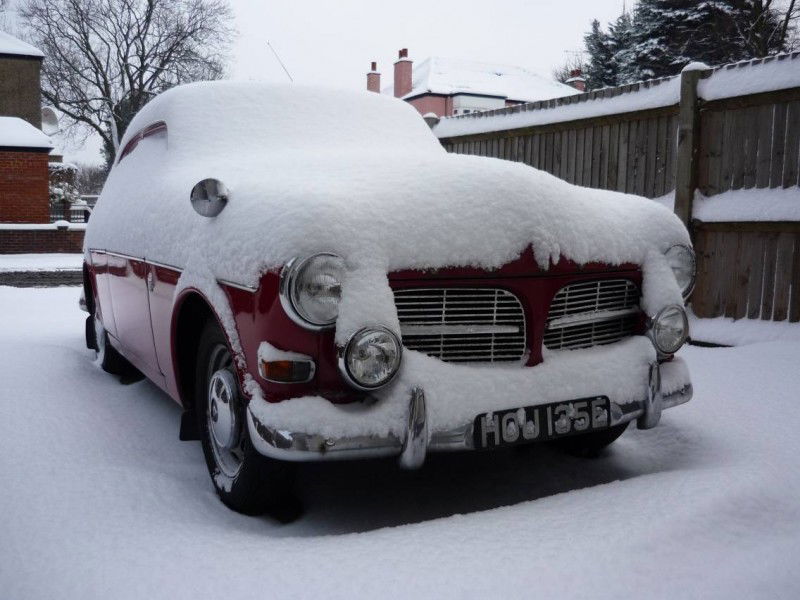 Volvo Amazon covered in snow
